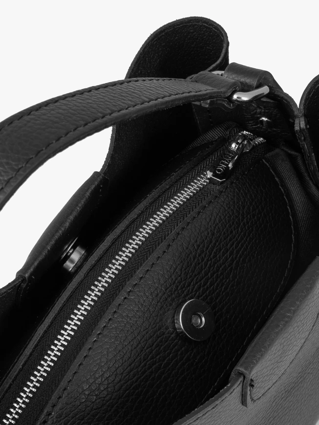 Handtasche in kombinierten Materialien