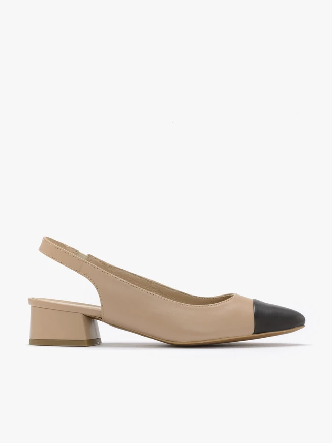 Beige pumps with black toe