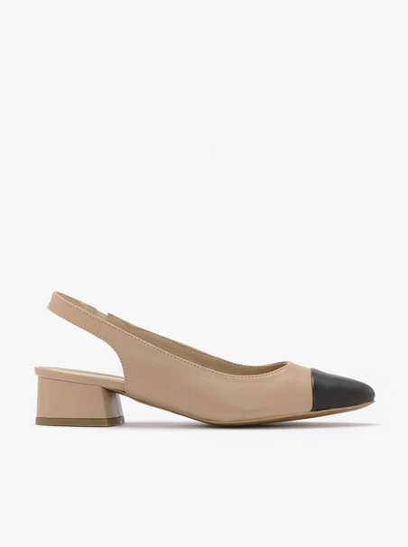 Beige pumps with black toe