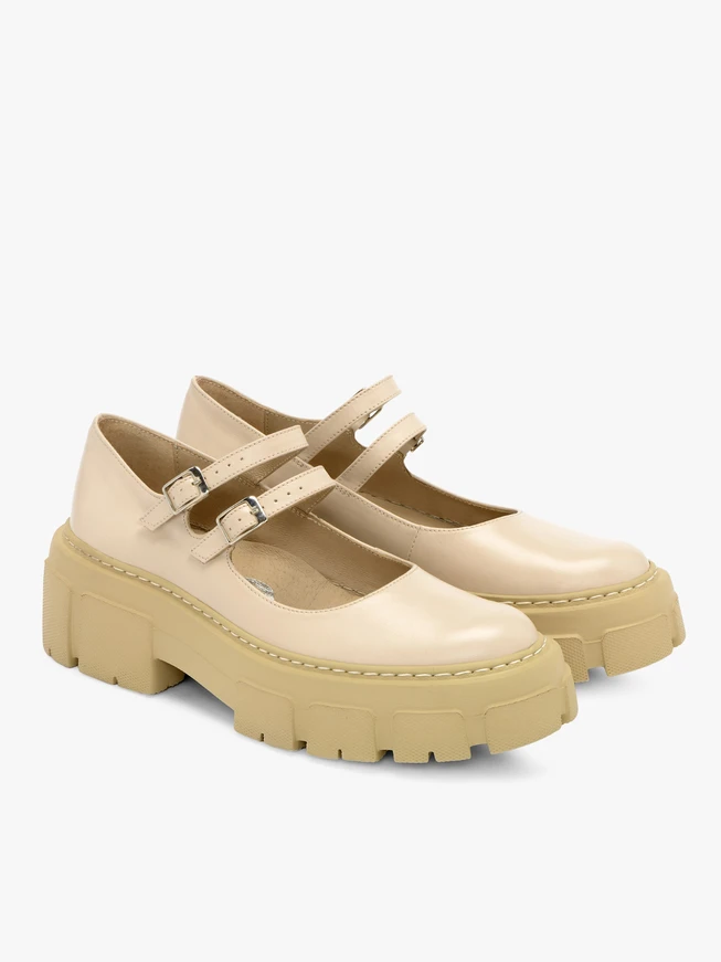 Beige pumps with decorative fastening