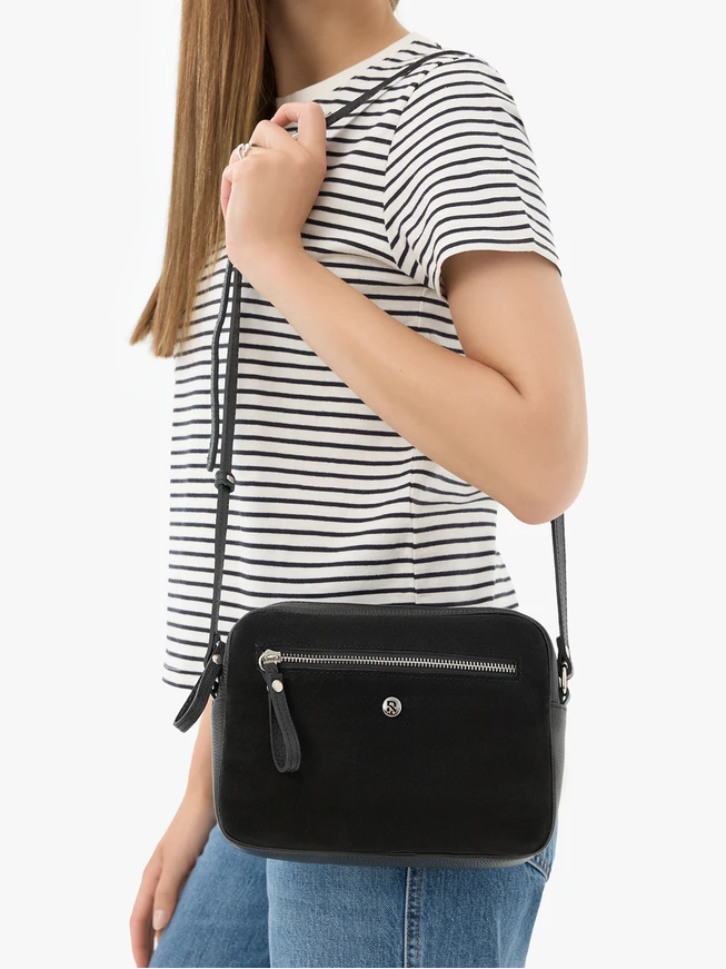 Black handbag with adjustable strap