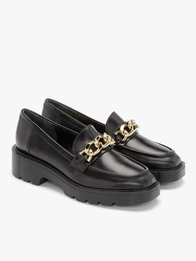 Black loafers with decorative chain