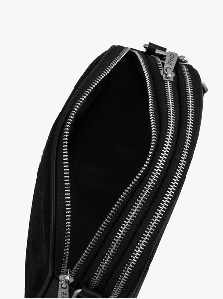 Schwarze Handtasche mit dekorativer Quaste