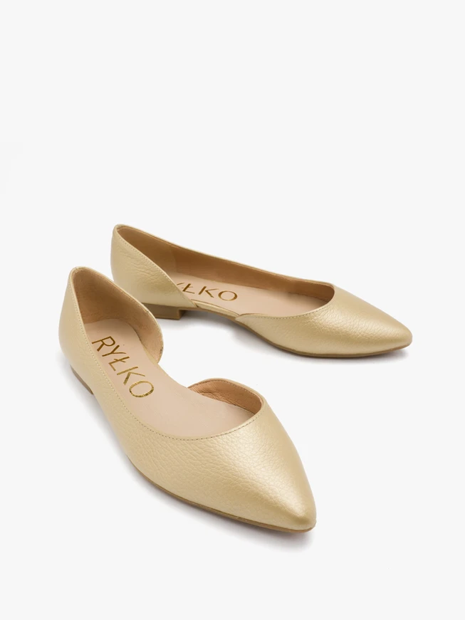Goldene Ballerinas mit verziertem Schaft