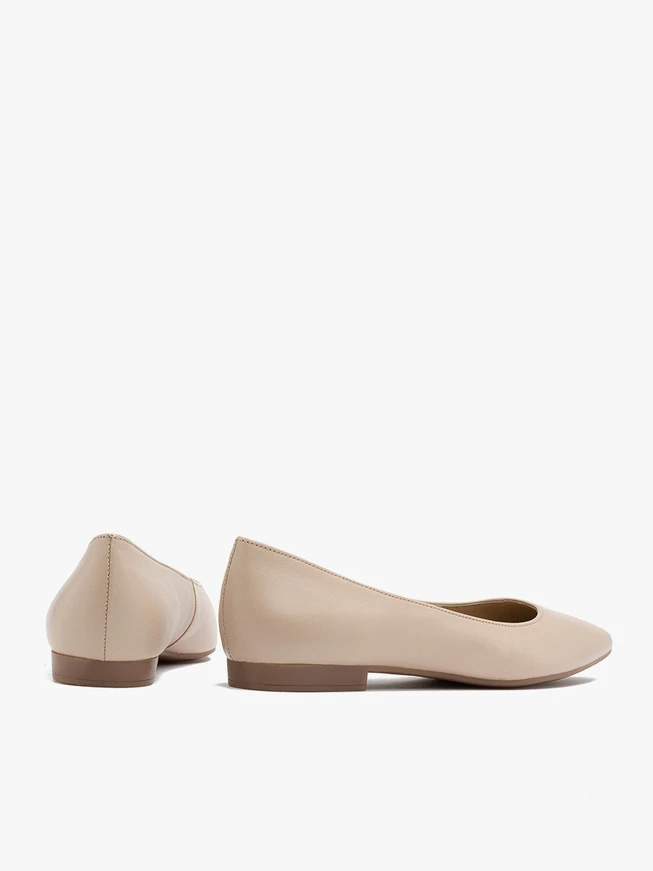 Beige pointed-toe ballerinas