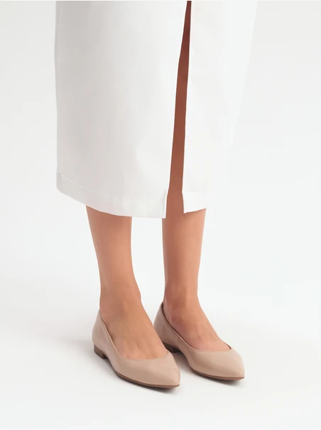 Beige pointed-toe ballerinas