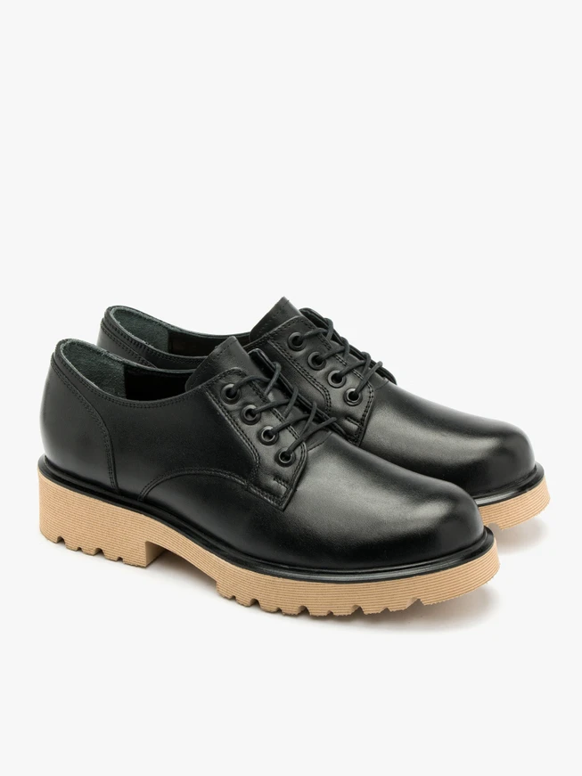 Black shoes with beige sole