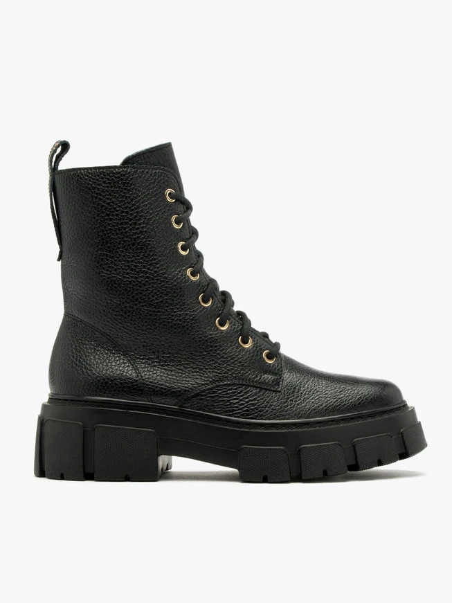 Schwarze Baggerstiefel mit leichtem Boden