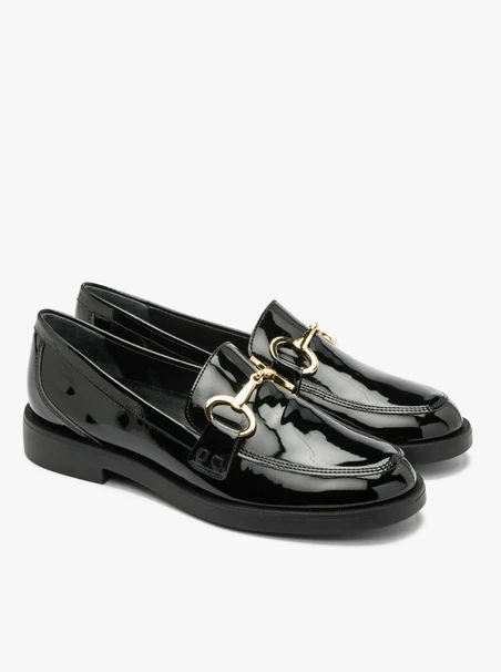 Black loafers with gold ornament