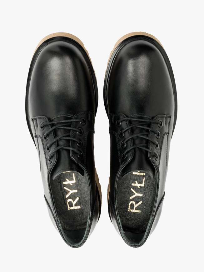 Black shoes with beige sole