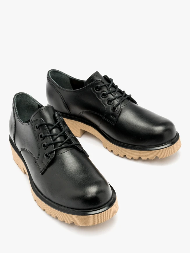 Black shoes with beige sole
