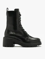 Schwarze isolierte Stiefel mit festem Boden