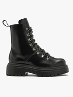 Schwarze isolierte Damenstiefel mit dicker Sohle aus natürlichem Schafsfell
