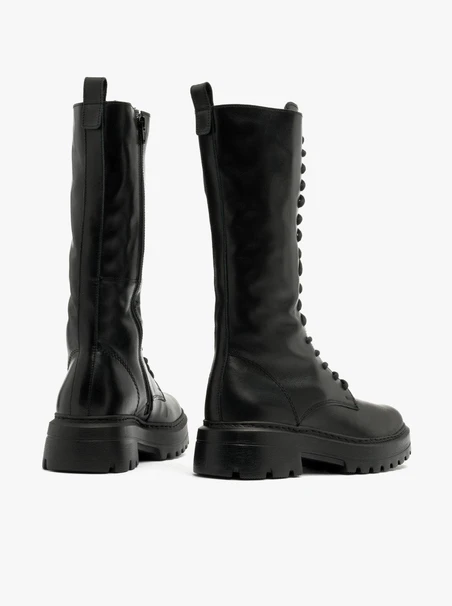 Tall black fur-lined boots