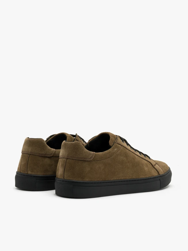 Olive sneakers with black sole