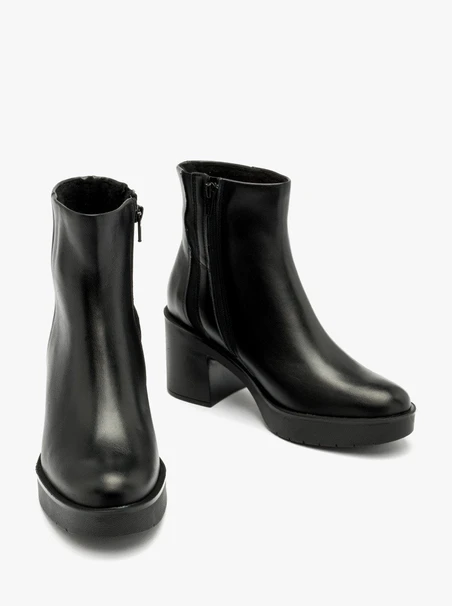 Black fur-lined ankle boots with chunky heel
