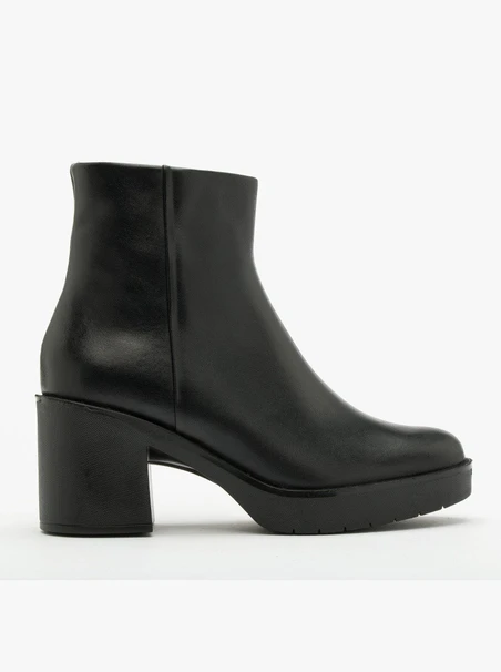 Black fur-lined ankle boots with chunky heel