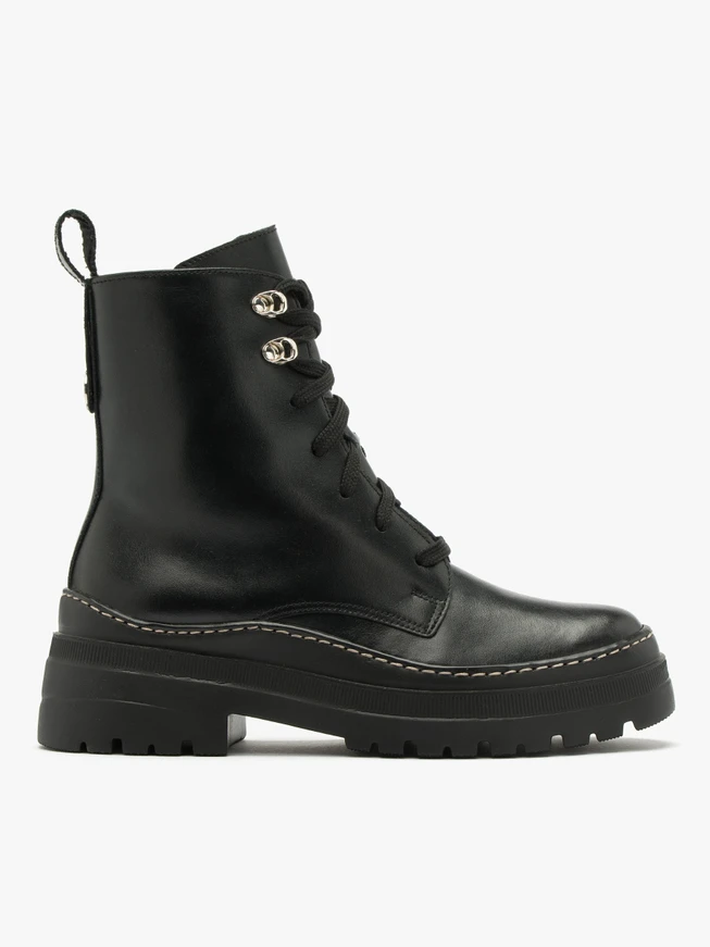 Schwarze Baggerstiefel mit dekorativer Sohle