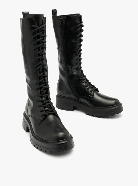 Tall black fur-lined boots
