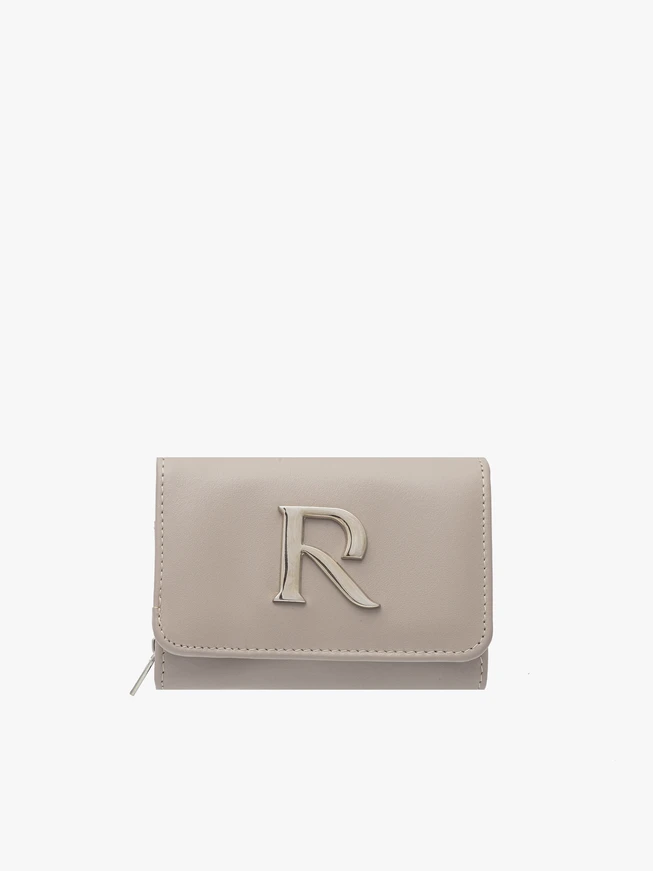 Beige women’s wallet with silver details