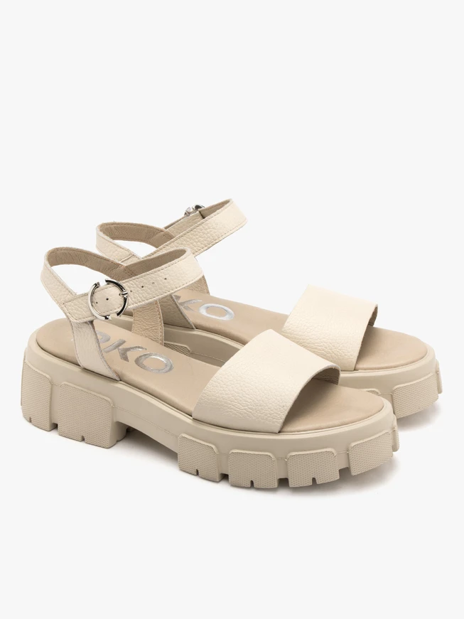 Cream sandals with silver buckle