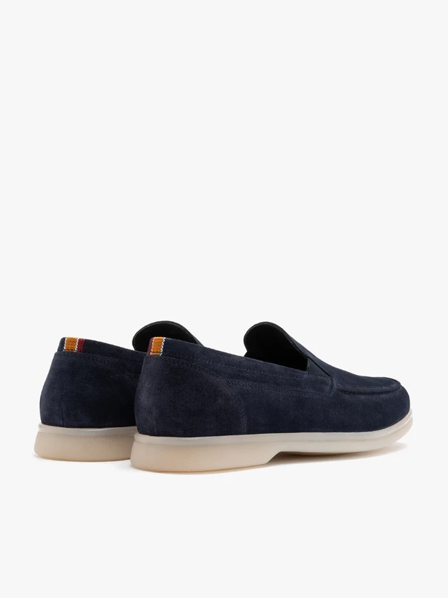 Navy men’s loafers with white sole