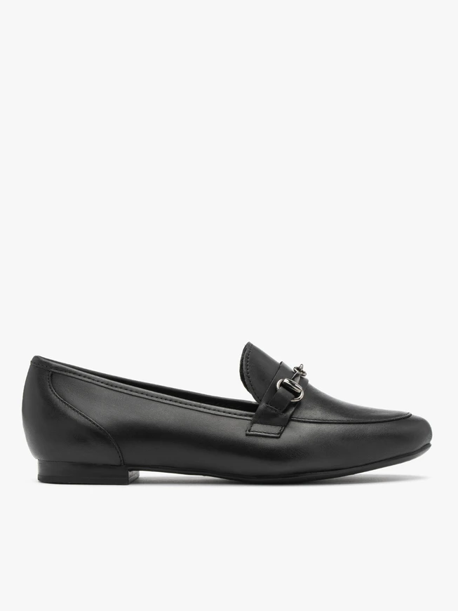 Black loafers with ornament on the upper