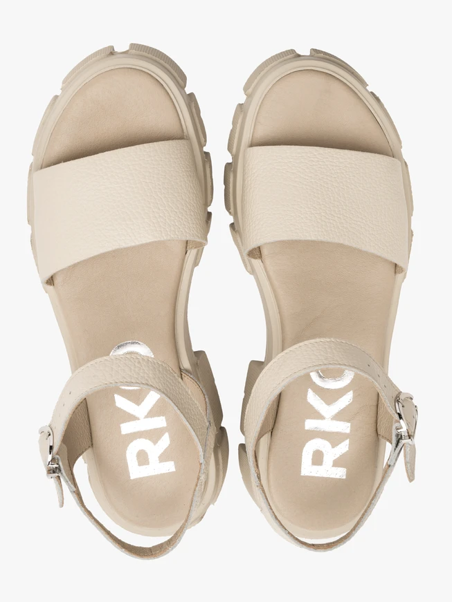 Cream sandals with silver buckle