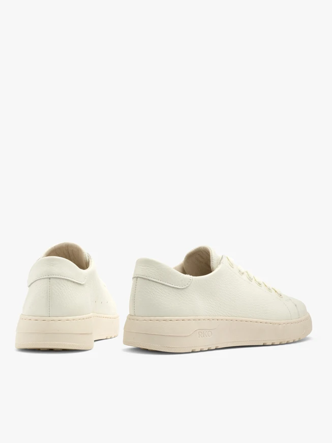 White sporty shoes with cream sole