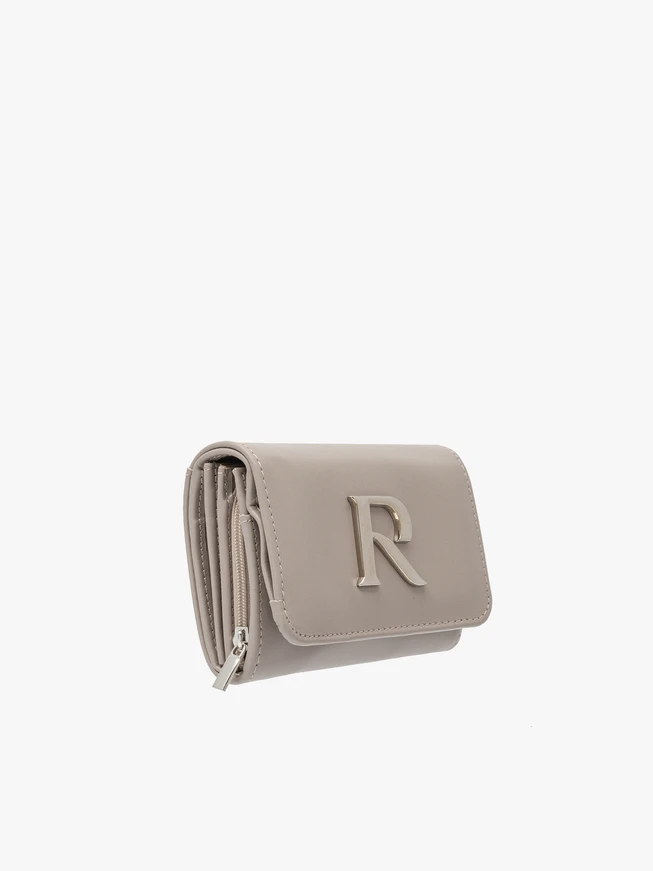 Beige women’s wallet with silver details