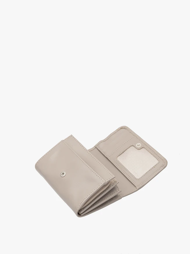 Beige women’s wallet with silver details