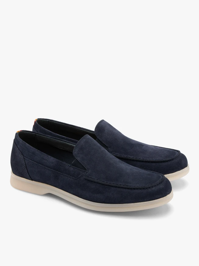 Navy men’s loafers with white sole