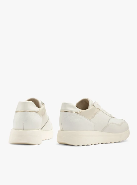 White sporty shoes with platinum heel tab