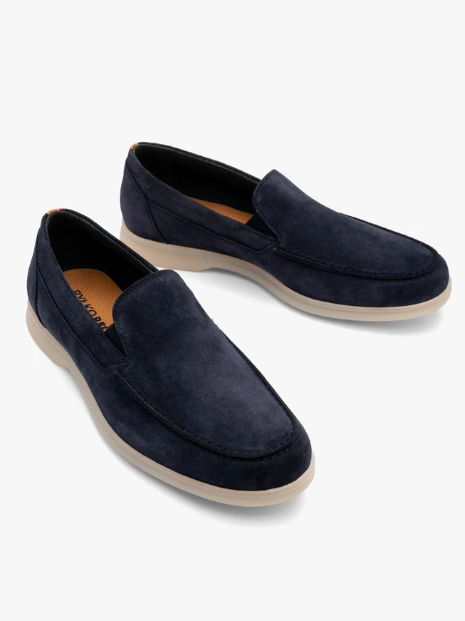 Navy men’s loafers with white sole
