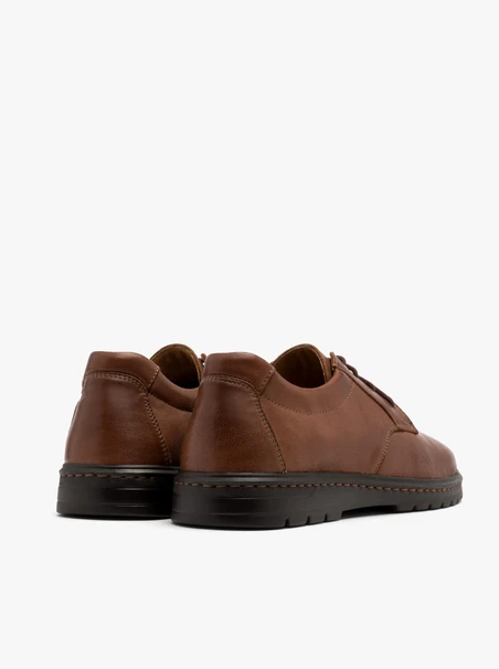 Braune Herrenhalbschuhe mit Ziernaht an der Sohle