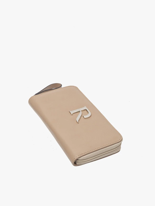 Beige women’s wallet with silver details