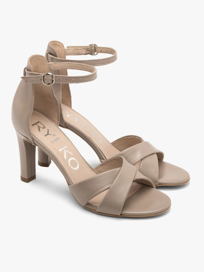 Beigefarbene Stiletto-Sandalen