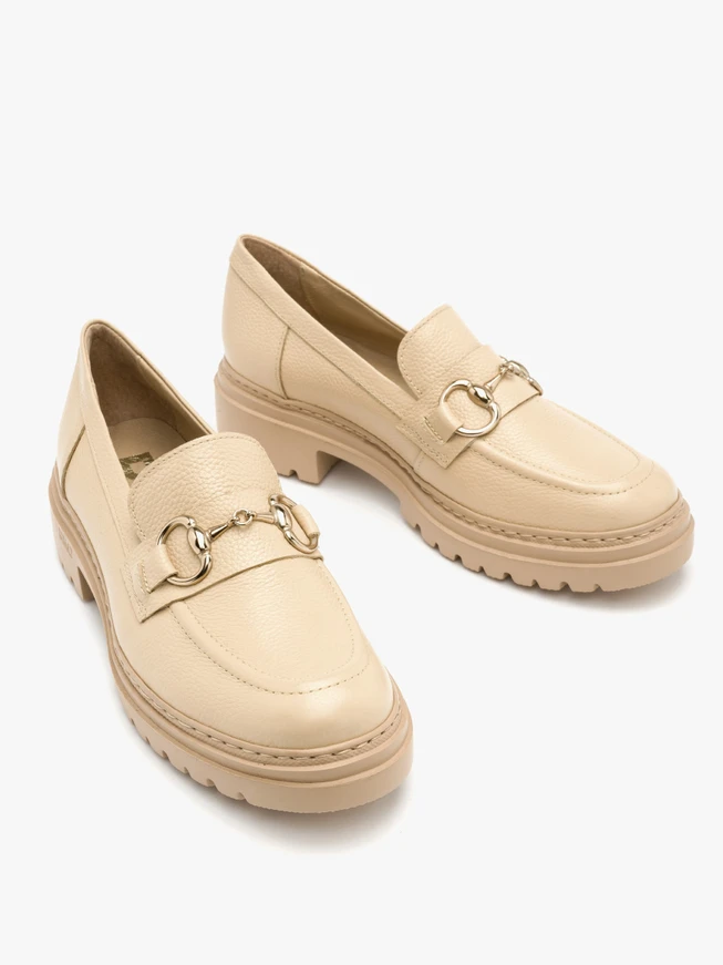 Beige loafers with gold ornament