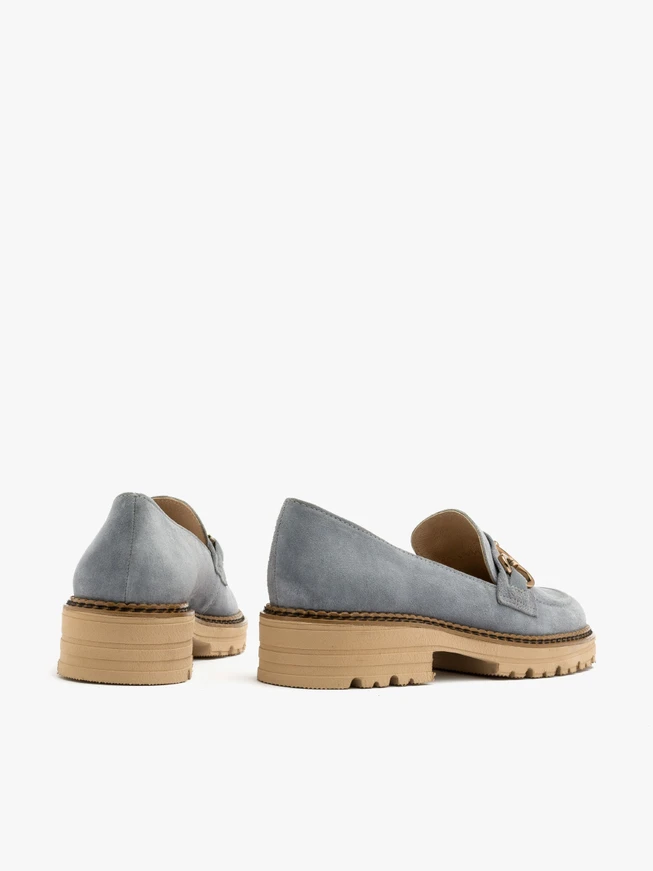 Blue loafers with gold ornament