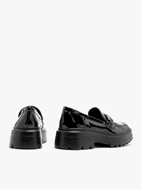 Black patent loafers with ornament