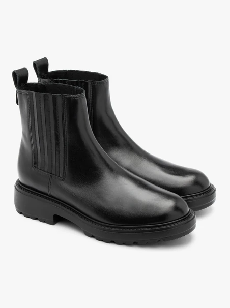 Schwarze isolierte Slingbacks mit Gumminähten