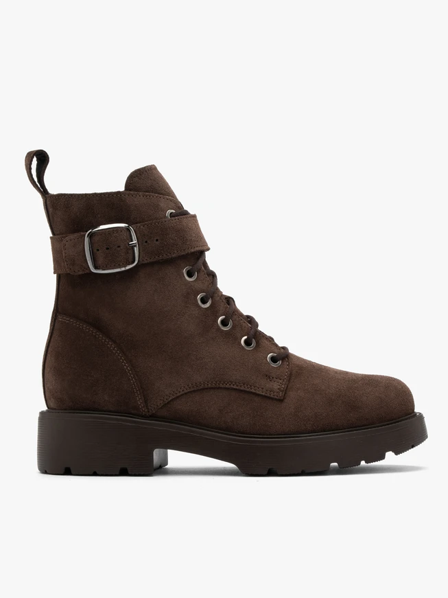 Brown women’s boots with decorative buckle