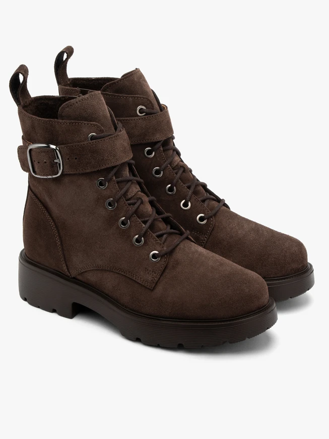 Brown women’s boots with decorative buckle