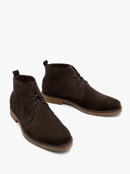 Brown men’s boots with beige sole