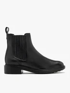 Women’s Chelsea boots with decorative stitching at the elastic