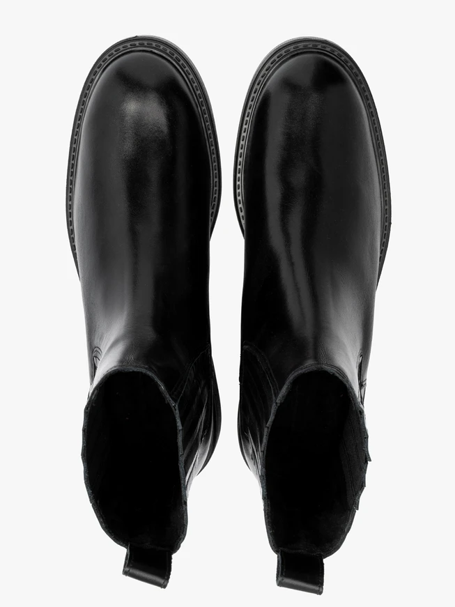 Black insulated Chelsea boots with stitched elastic