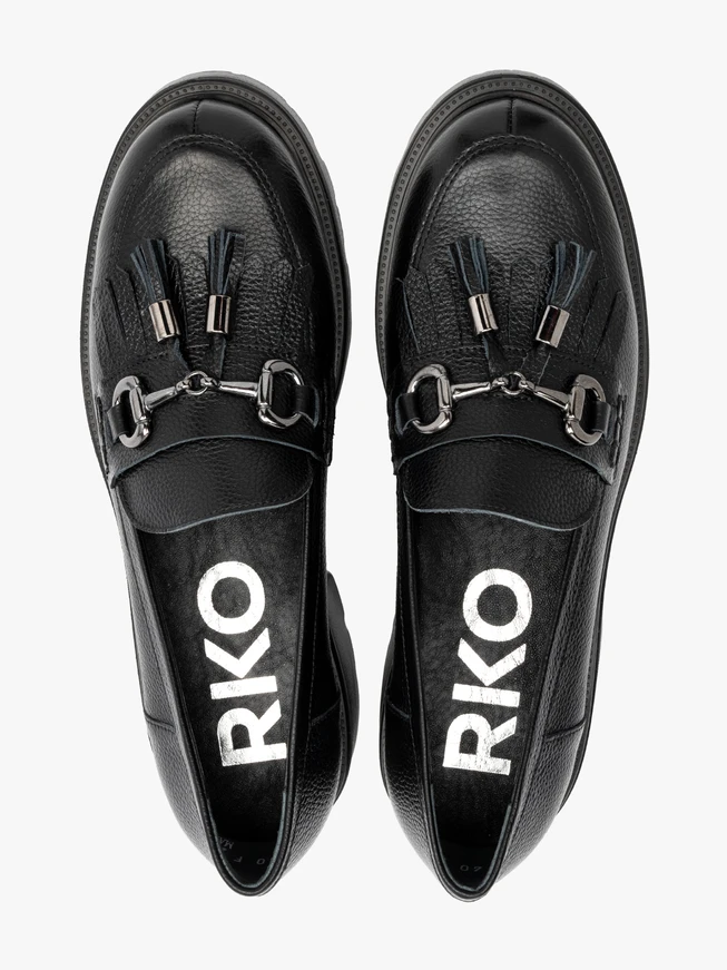Black loafers with tassels