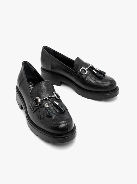 Black loafers with tassels