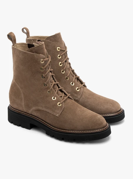 Beige women’s suede ankle boots