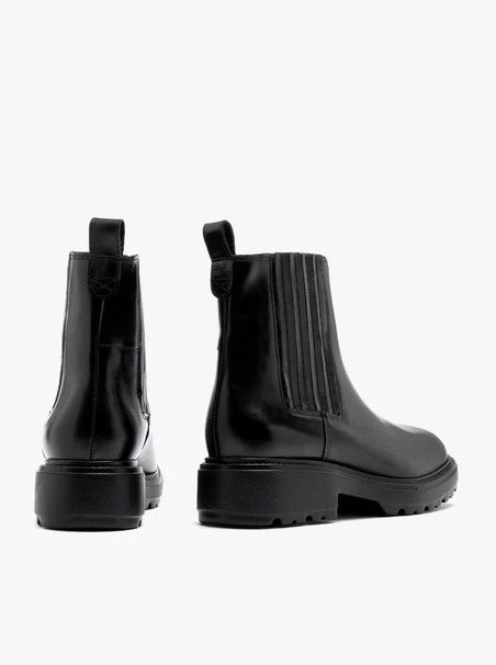Schwarze isolierte Slingbacks mit Gumminähten
